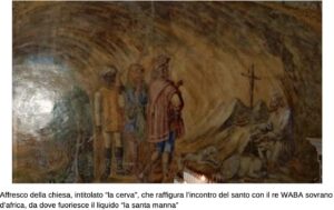Affresco della chiesa, intitolato “la cerva”, che raffigura l’incontro del santo con il re WABA sovrano d’africa, da dove fuoriesce il liquido “la santa manna”